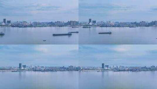 九江市黄昏江畔天际线与长江水运航拍延时高清在线视频素材下载