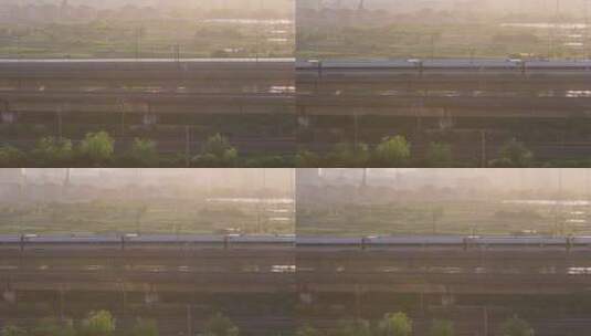 城市乡村铁路上行驶的高铁动车高清在线视频素材下载