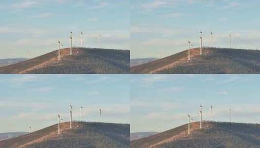 山顶上的电力风车高清在线视频素材下载