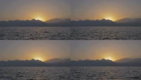 带山脉和日落的海景高清在线视频素材下载