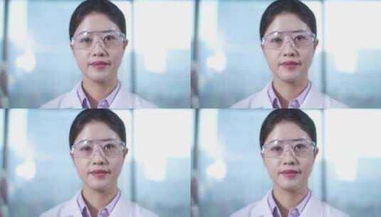 女性科研人员戴着护目镜在生物实验室做实验高清在线视频素材下载
