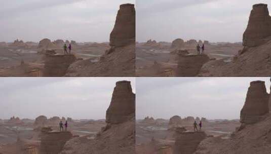 游客在沙漠中欣赏大自然的美景。高清在线视频素材下载