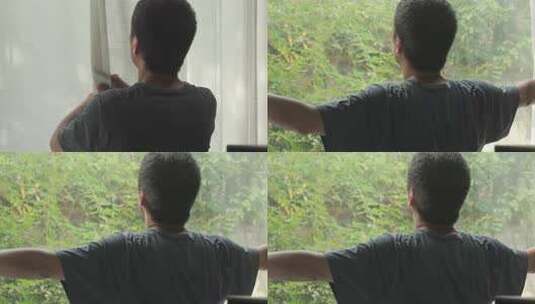 男人在家放松身心拉开窗帘眺望窗外高清在线视频素材下载