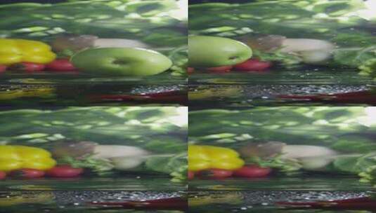2K竖屏一个青苹果掉落蔬果中高清在线视频素材下载