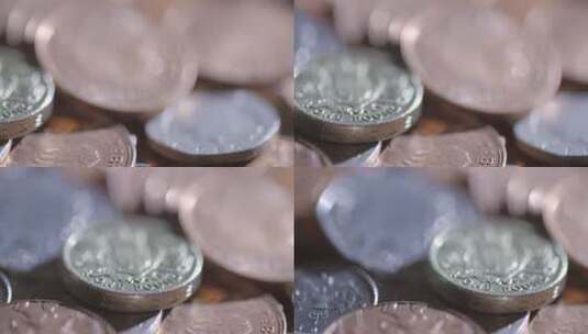 桌子上的硬币特写高清在线视频素材下载