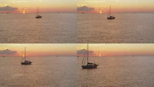 日落时分飞过帆船高清在线视频素材下载