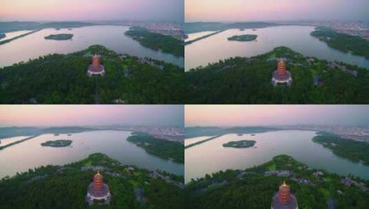 航拍夕阳杭州著名景点西湖风景区雷峰塔高清在线视频素材下载