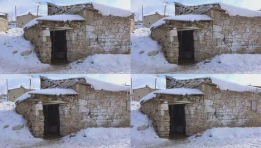 积雪覆盖的老岩石房子高清在线视频素材下载