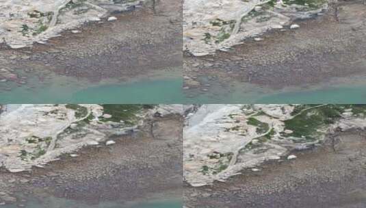 旅游景区福建湄洲岛海边风化礁石竖屏航拍高清在线视频素材下载