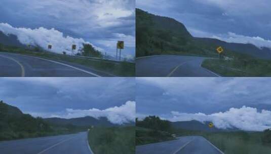 沿着弯曲的公路穿过山脉高清在线视频素材下载