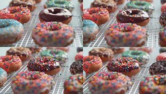 糖针洒在甜甜圈上慢镜头高清在线视频素材下载