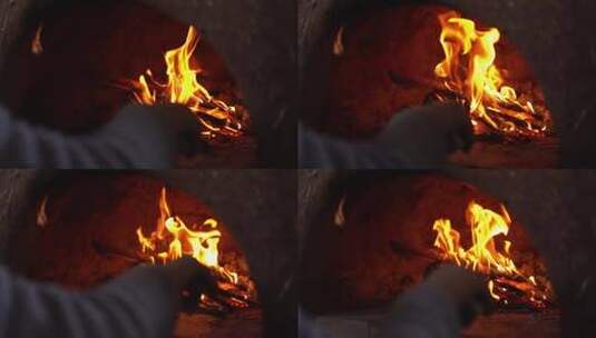 实拍灶台里柴火燃烧的火焰高清在线视频素材下载