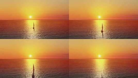 夕阳下唯美的孤帆高清在线视频素材下载