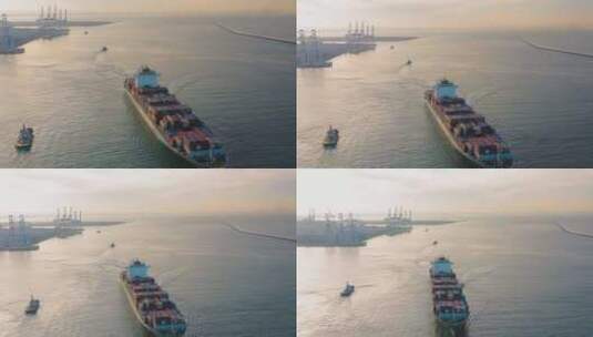 黄昏航拍进出口货运集装箱船只在海上航行高清在线视频素材下载