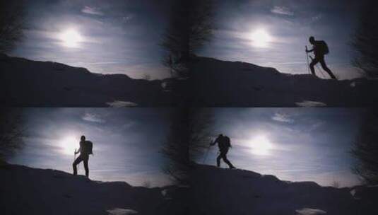 徒步旅行者在雪山上行走高清在线视频素材下载