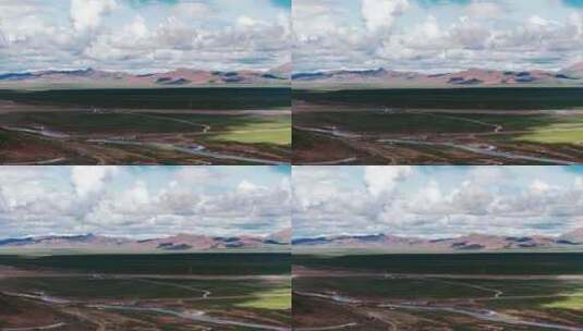 蓝天白云之下的青藏高原山川草原大气航拍高清在线视频素材下载