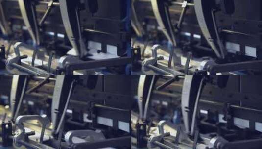 印刷厂流水线生产快速工作的机械高清在线视频素材下载