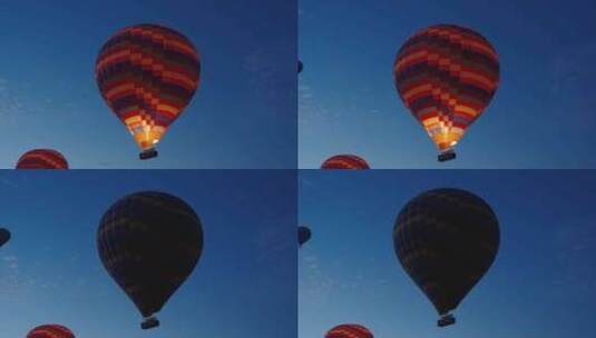五颜六色的热气球，里面的人在空中，仍然是高清在线视频素材下载