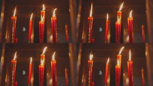 红色蜡烛点燃燃烧火焰寺庙高清在线视频素材下载