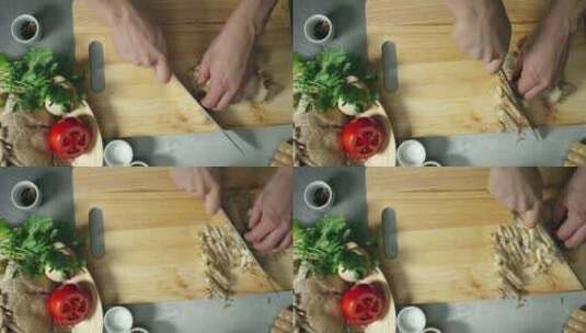 餐厅厨师在案板上切菜特写镜头高清在线视频素材下载