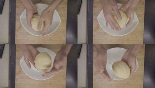 厨师在家里用传统的方式用手在一个白色的大高清在线视频素材下载