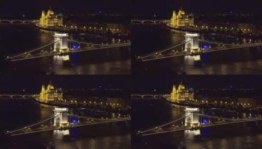 沿河建筑和大桥夜景高清在线视频素材下载