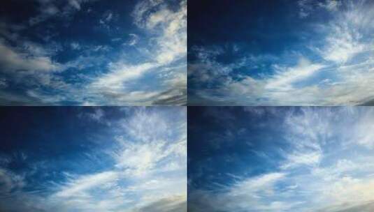 早晨云朵上方的深蓝色天空高清在线视频素材下载