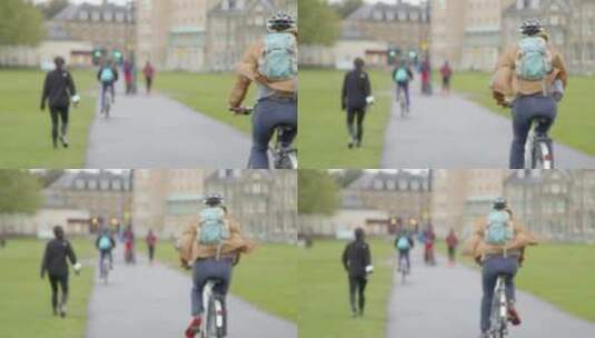 骑自行车的人和行人通过停车场的长镜头高清在线视频素材下载