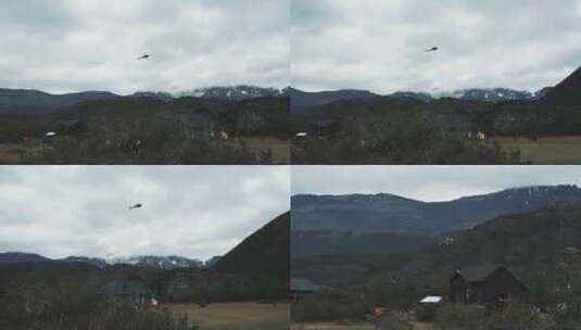 直升机飞过雪山营地高清在线视频素材下载
