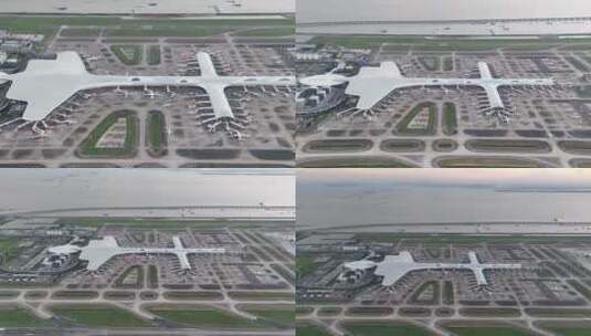 高空俯瞰深圳宝安机场：总体造型如深海飞鱼高清在线视频素材下载