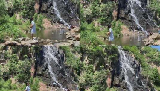 济南市历城黄巢水库，高空流水而下形成瀑布高清在线视频素材下载