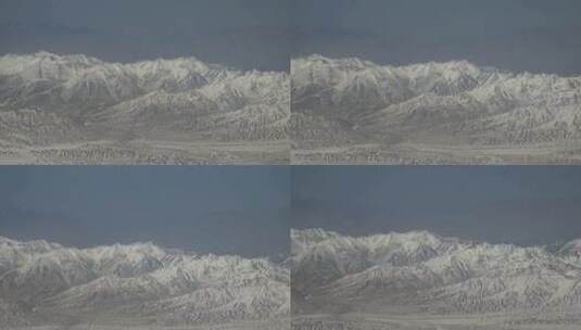 飞机窗外青海祁连山脉雪山群峰风光高清在线视频素材下载