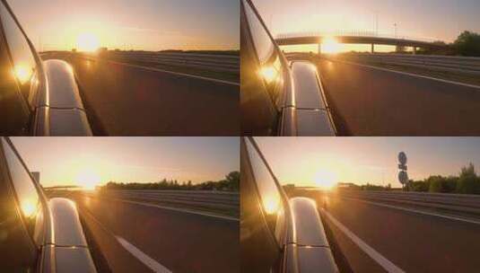 夕阳下汽车在高速公路上奔驰高清在线视频素材下载