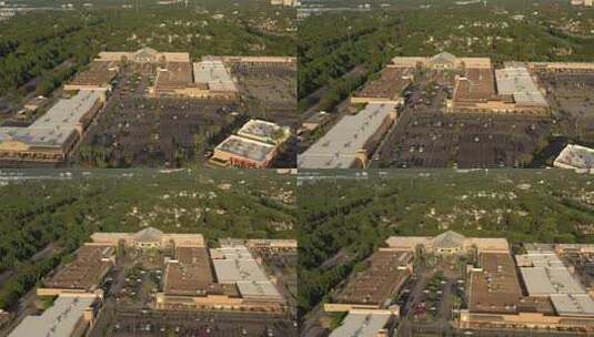 无人机视图飞向佛罗里达州德斯廷银沙奥特莱斯购物中心的中心球场区域。高清在线视频素材下载