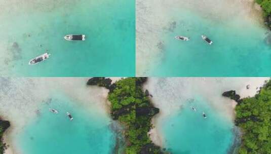 在菲律宾巴拉望清澈的海水上拉出快艇的空中俯视图高清在线视频素材下载