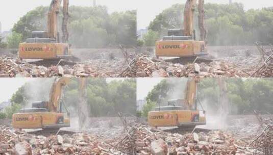 挖掘机在拆除建筑垃圾高清在线视频素材下载
