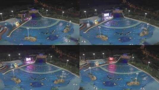 航拍上海玛雅海滩水公园游泳池夜景高清在线视频素材下载