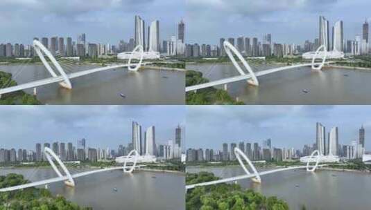 南京眼步行桥，奥体双子塔的航拍风光高清在线视频素材下载