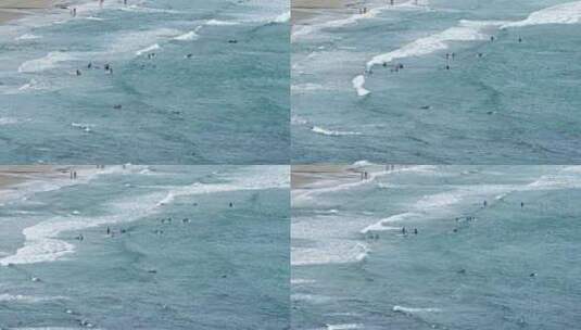 海南万宁海边冲浪的人们高清在线视频素材下载