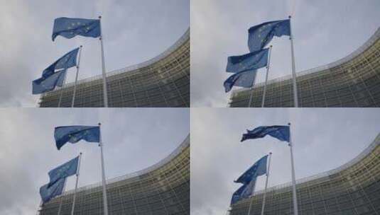 欧盟旗帜在布鲁塞尔欧盟委员会大楼前迎风飘高清在线视频素材下载