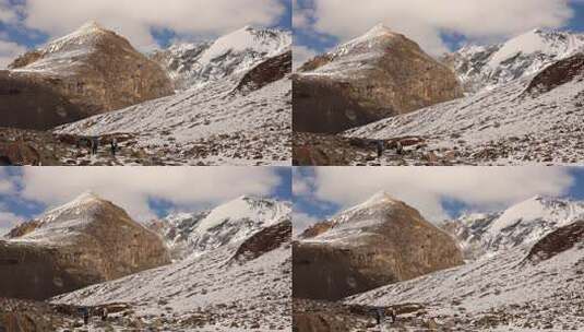 岷山山脉雪宝顶雪山下的登山者徒步进山高清在线视频素材下载