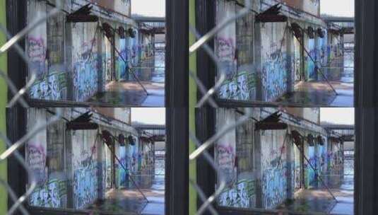 市区废弃建筑上的城市涂鸦高清在线视频素材下载