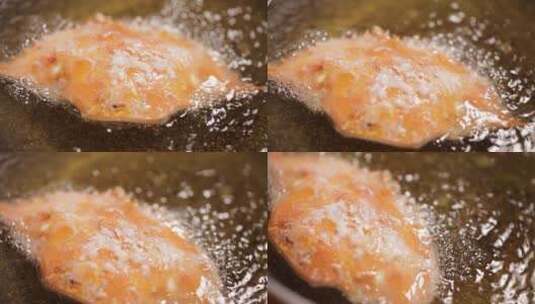 螃蟹裹淀粉油炸定型高清在线视频素材下载