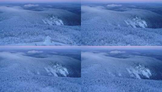 航拍大兴安岭雪色山岭冷空气晨光高清在线视频素材下载