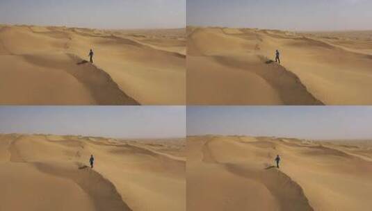 一个人在沙漠中行走高清在线视频素材下载