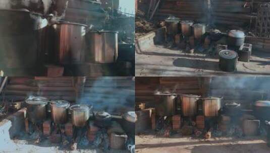 农村煮饭视频农村年节杀猪饭简易火炉锅灶高清在线视频素材下载