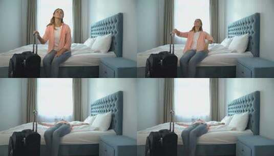 女士带着手提箱环顾卧室高清在线视频素材下载
