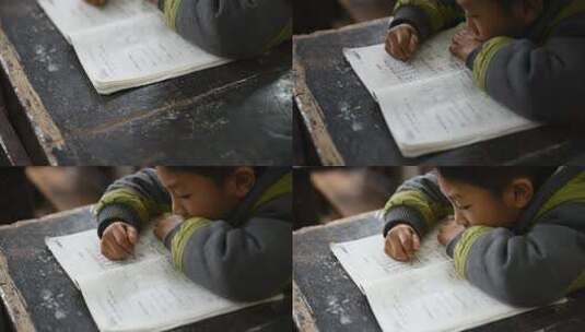 山区贫困儿童认真写字高清在线视频素材下载