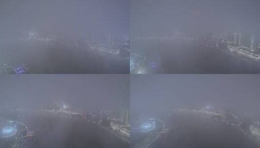 航拍上海黄浦江沿岸外滩地标建筑群夜景高清在线视频素材下载