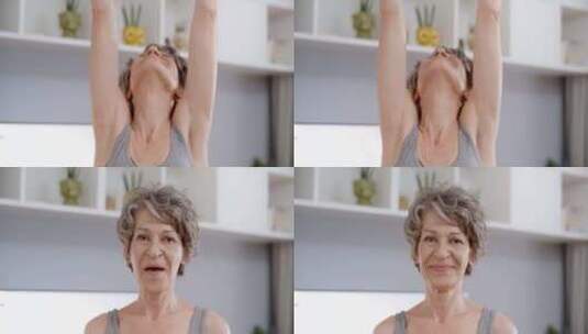 老年妇女在家庭健身训练中做哑铃运动的肖像高清在线视频素材下载